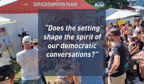 Does the setting shape the spirit of our democratic conversations?